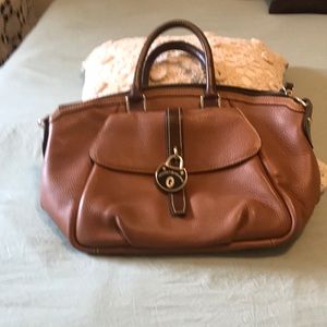 Dooney & Bourke Florentine satchel used but in good conditions.